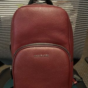 Michael Kors sling backpack/ purse